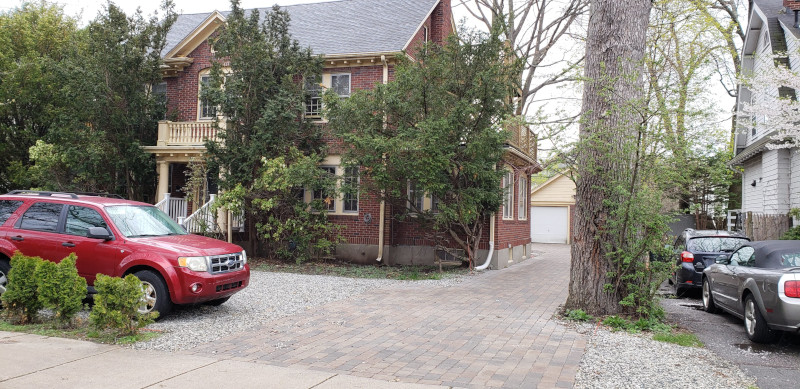 House with car In apartment parking space